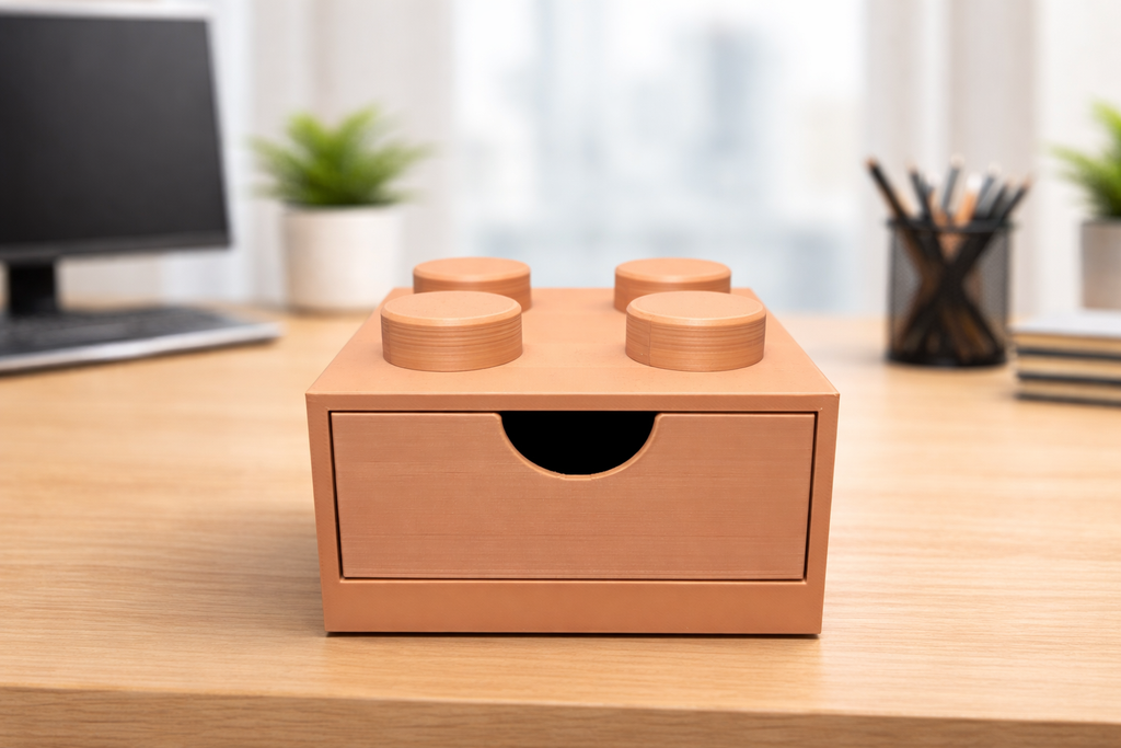 Lego-inspired 3D-printed 2×2 brick featuring a smooth sliding drawer.