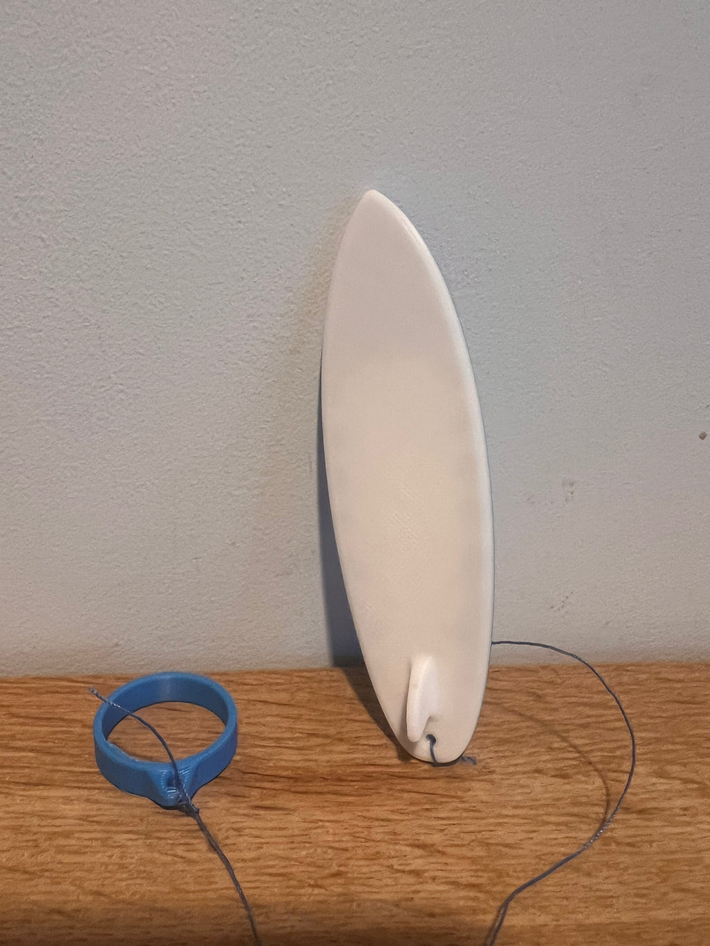 Cool Mini Wind Surf Board - Complete with a built-in finger loop for easy grip and control.