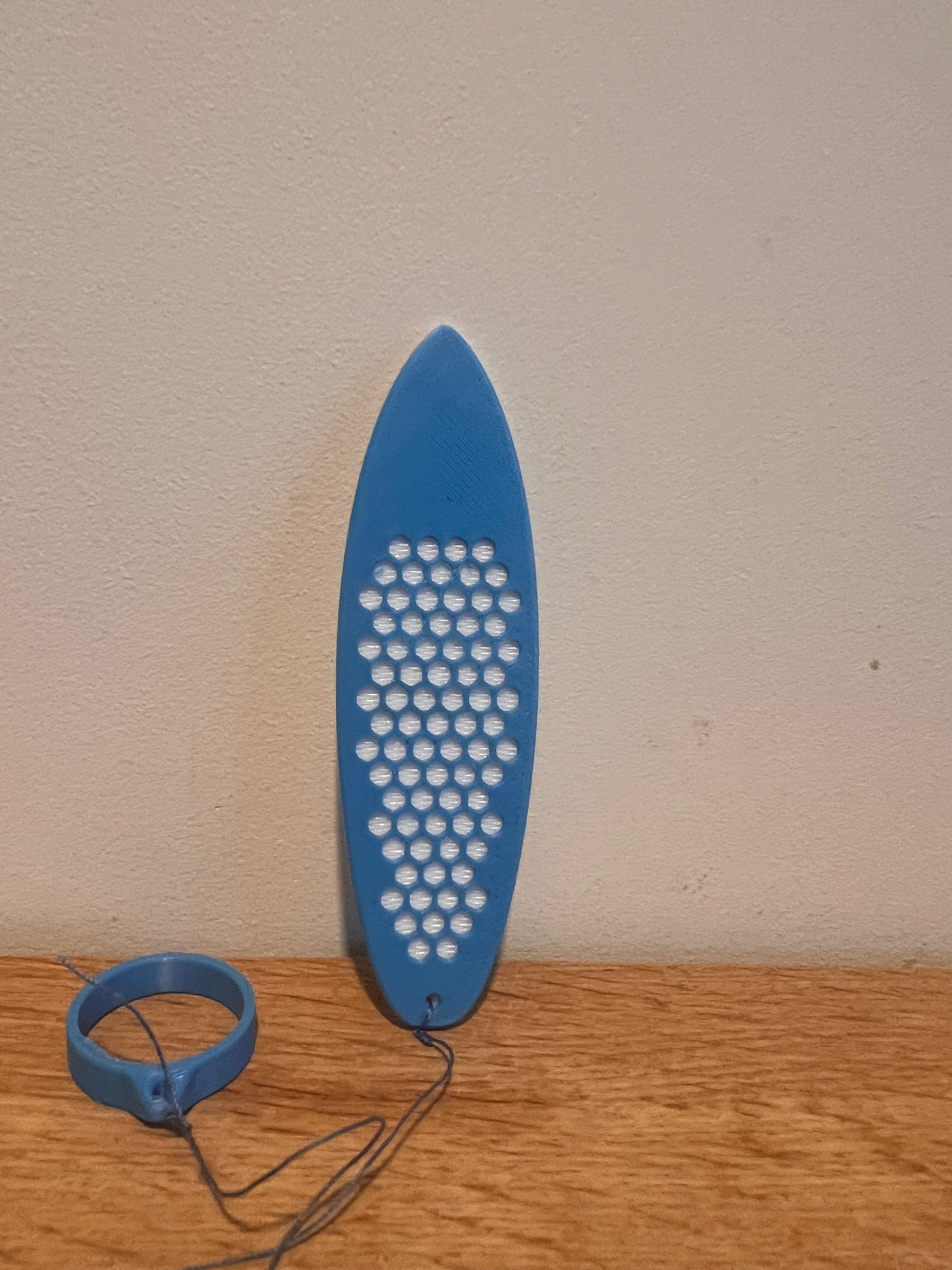 Cool Mini Wind Surf Board - Complete with a built-in finger loop for easy grip and control.