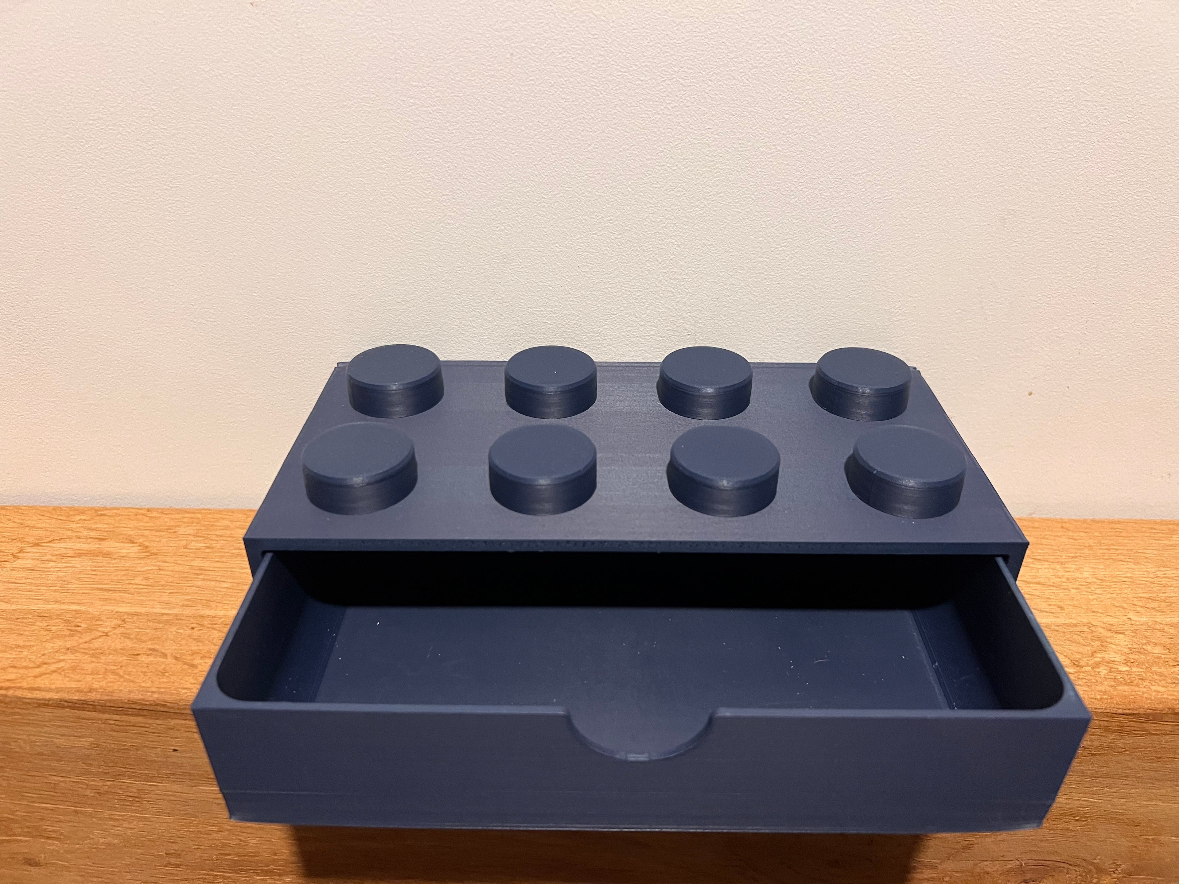 Lego-inspired 3D-printed 4×2 brick featuring a smooth sliding drawer.