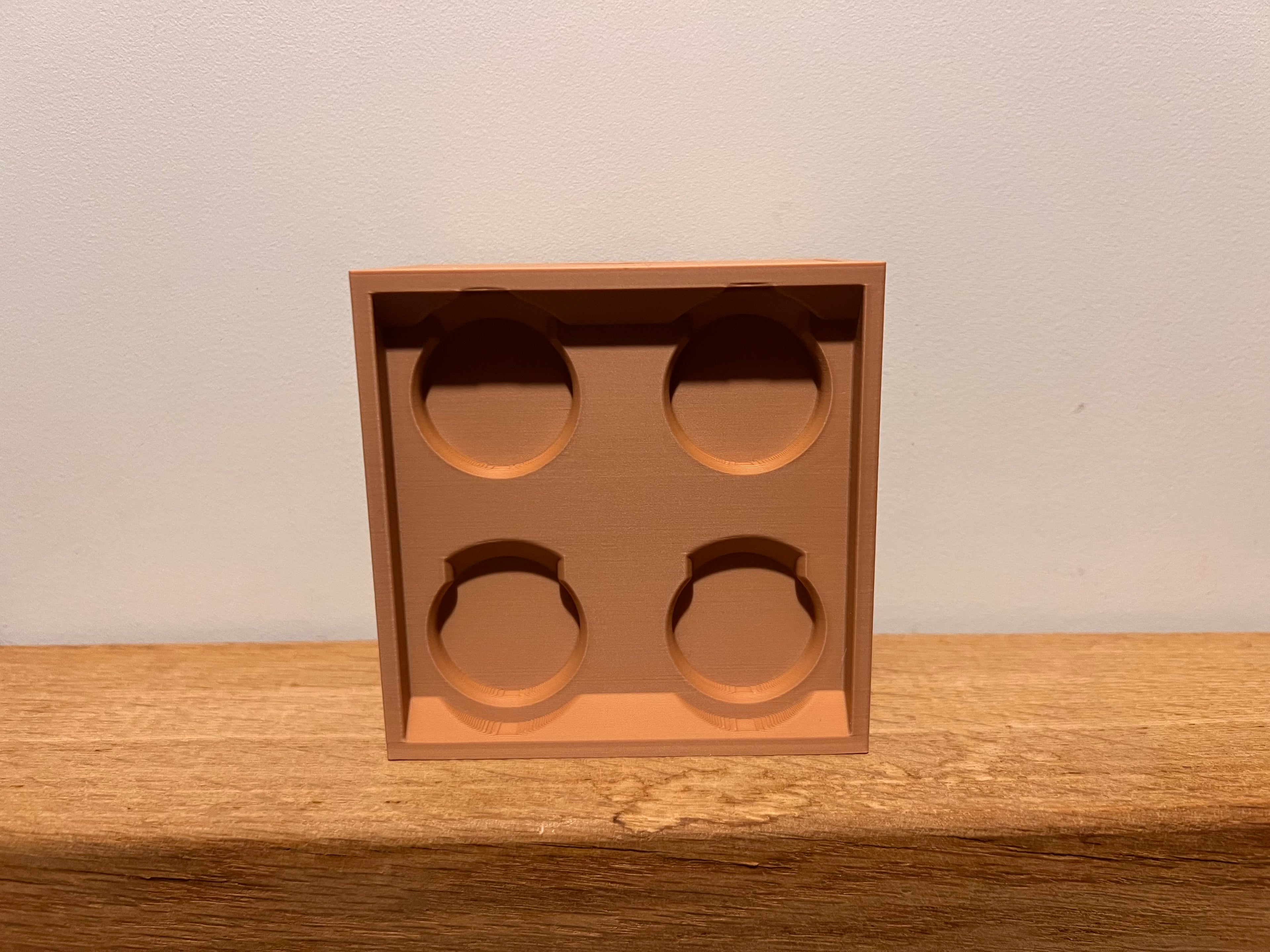 Lego-inspired 3D-printed 2×2 brick featuring a smooth sliding drawer.
